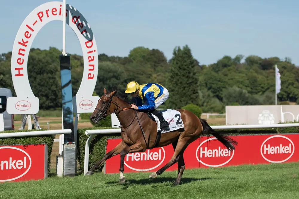 Well Timed und Jockey Filip Minarik beim Zieleinlauf des Hauptrennens um den Henkel-Preis der Diana